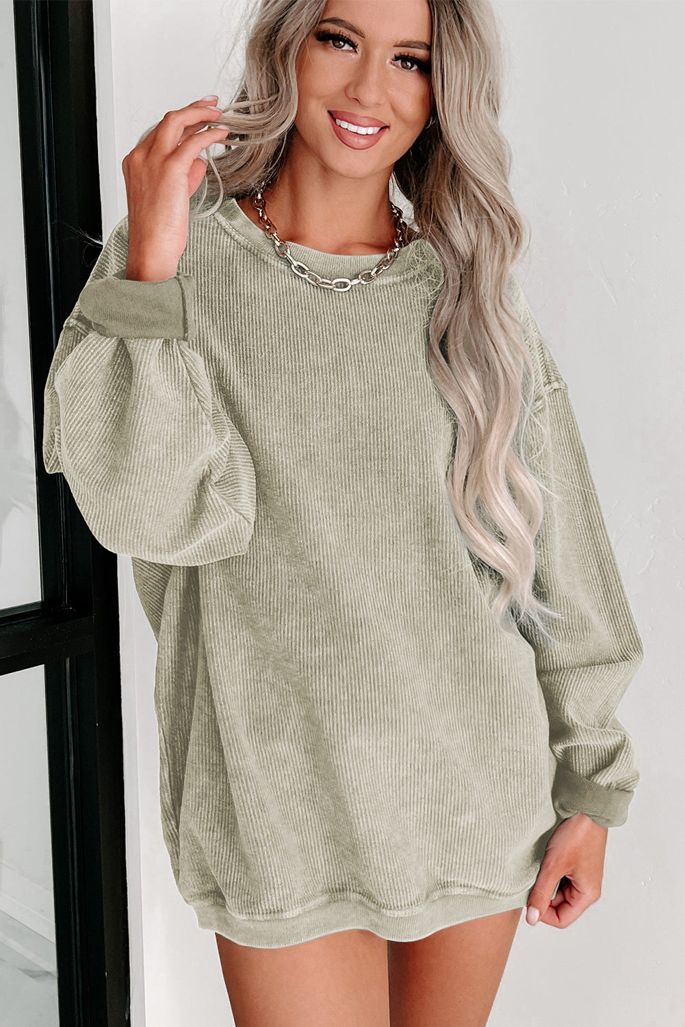 Pink Solid Ribbed Round Neck Pullover Sweatshirt